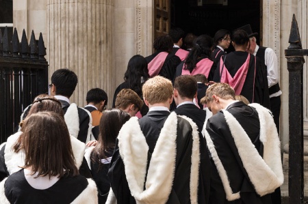 Group of students entering doorway