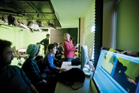 Students studying at computer workstations