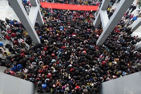 People crowding in doorway