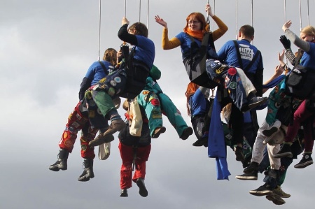 Group of abseilers hanging from lines