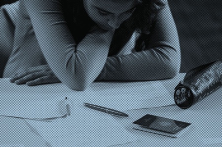 Female student concentrating on paperwork