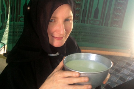 Elisabeth Kendall holding bowl of soup