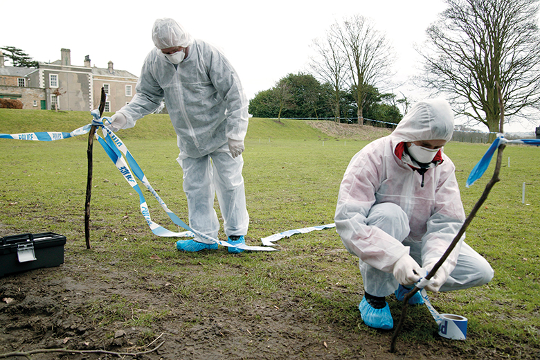 Forensic investigators at a crime scene