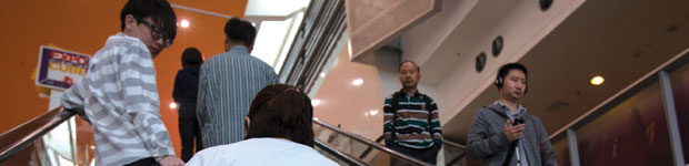 Six people on escalator