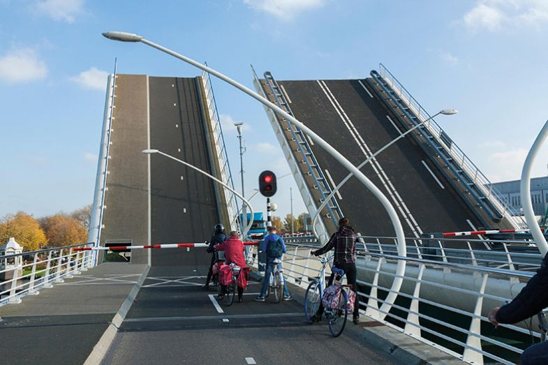 cyclists on bridge