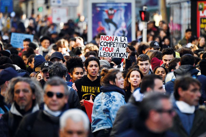 High school students take part in a demonstration in Marseille, southern France, against education reforms including stricter university entrance requirements