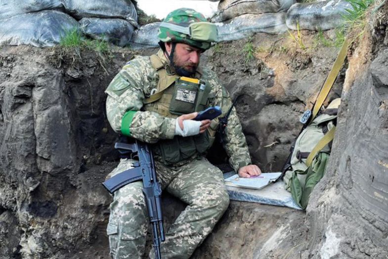 Professor Fedir Shandor, giving a lecture to students whilst fighting for Ukraine