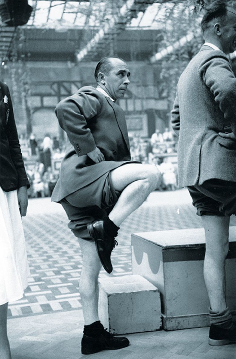 man balancing on one leg