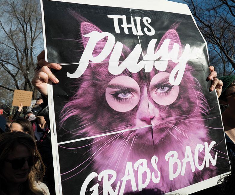 Protester holds sign