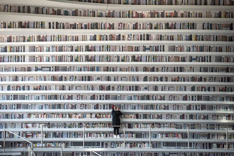 Many books on shelves