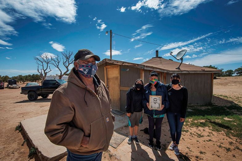 Family pose at their property in Arizona.