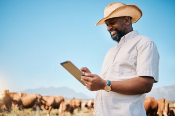 An African man running an agribusiness