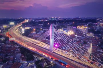  Aerial view of glowing Pasupati overpass at evening in Bandung city