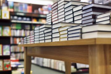 Books on a display table in a bookshop