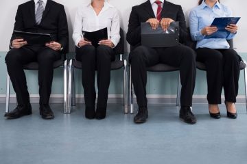 Business people waiting to attend job interview