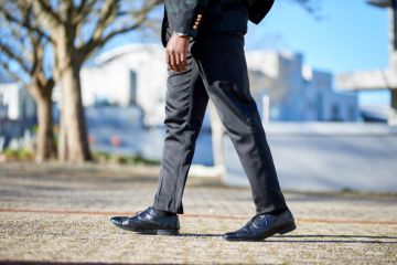 Businessman feet walking