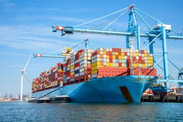 A heavily loaded container ship in Rotterdam, symbolising internationalisation