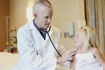 Doctor with child patient