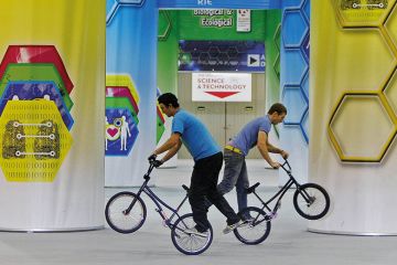 2 BMX riders at a science and technology exhibition in Dublin. To illustrate the merger of 2 funding agencies to form Research Ireland.