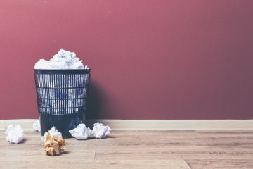 A full wastepaper basket