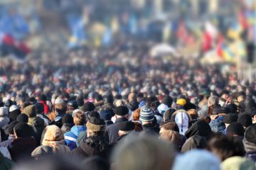 Large crowd of people illustrating crowdfunding for university activities