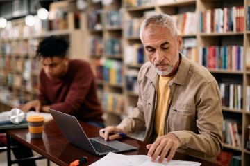 A mature student studying