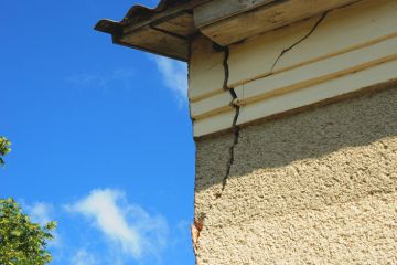 A cracked building, illustrating low standards