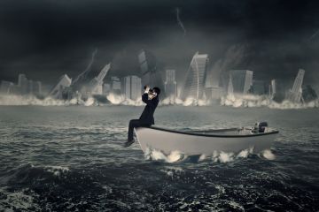 A man in a boat views a storm through binoculars as buildings fall behind him, symbolising social media storms