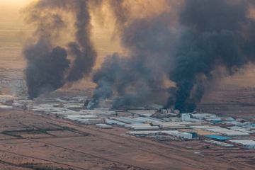 Burning buildings in Sudan