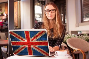 Student with British laptop