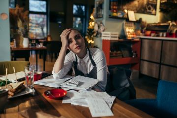 A tired student waitress