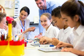 Young children learning in primary school lesson