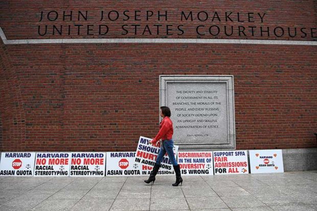 woman-walking-past-signs