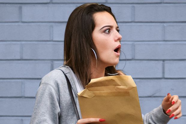 Woman receiving exam results