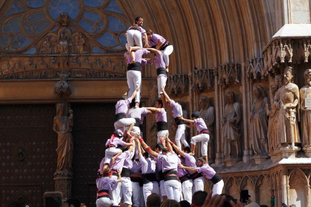 A human pyramid, symbolising affirmative action