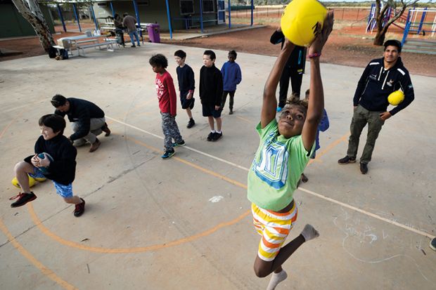 children playing basketball