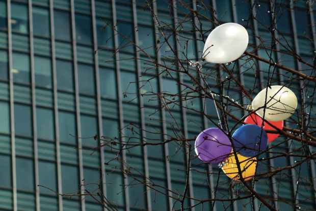 Balloons caught in tree