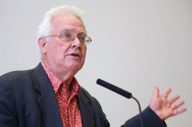 Benedict Anderson speaking at lectern