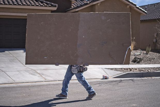 builder moving drywall