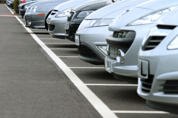 A car park on a busy day to illustrate an article about parking on a university campus