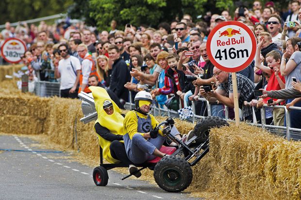 go-kart crashes into hay bales