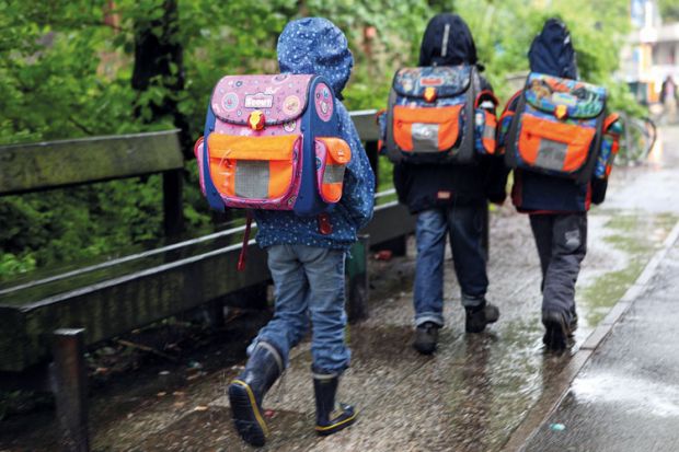 Children walking to school, Berlin, Germany