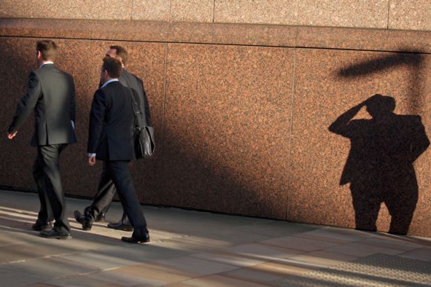 City men walking with shadow