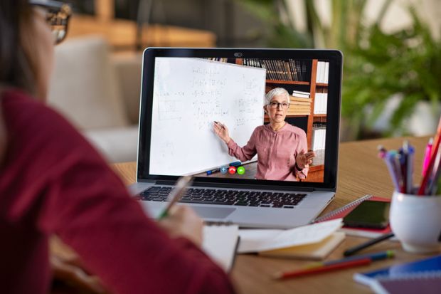 A student watches an online lesson