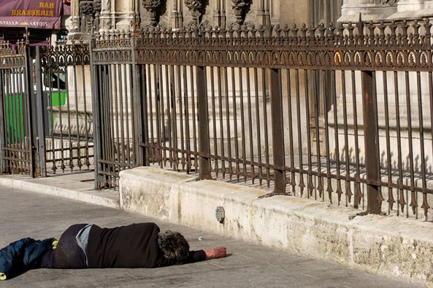 Drunk in front of a church