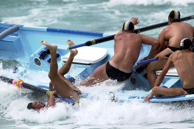 men fall off boat