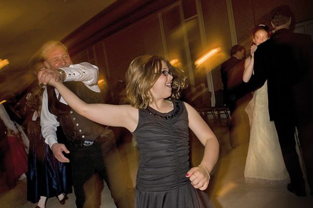 Father dancing with daughter