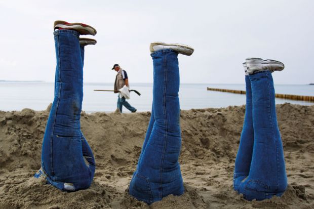 People with their heads in the sand