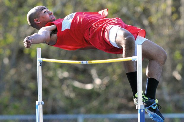 man doing high jump to illustrate predicted grades 