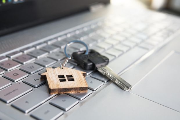 a house key on a computer